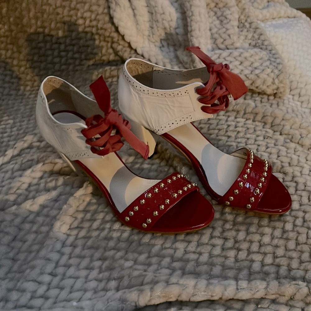 All black size 7.5 red and white heels, vintage.